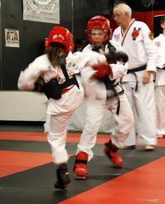 Elena Grace sparring against her brother Christian. I imagine most siblings wish they had a sanctioned space for beating on each other!