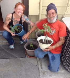 with Charlie (and the tomato plants he tended all summer) at the back kitchen-door of our restaurant.