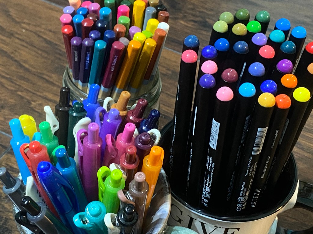 colored pens and pencils