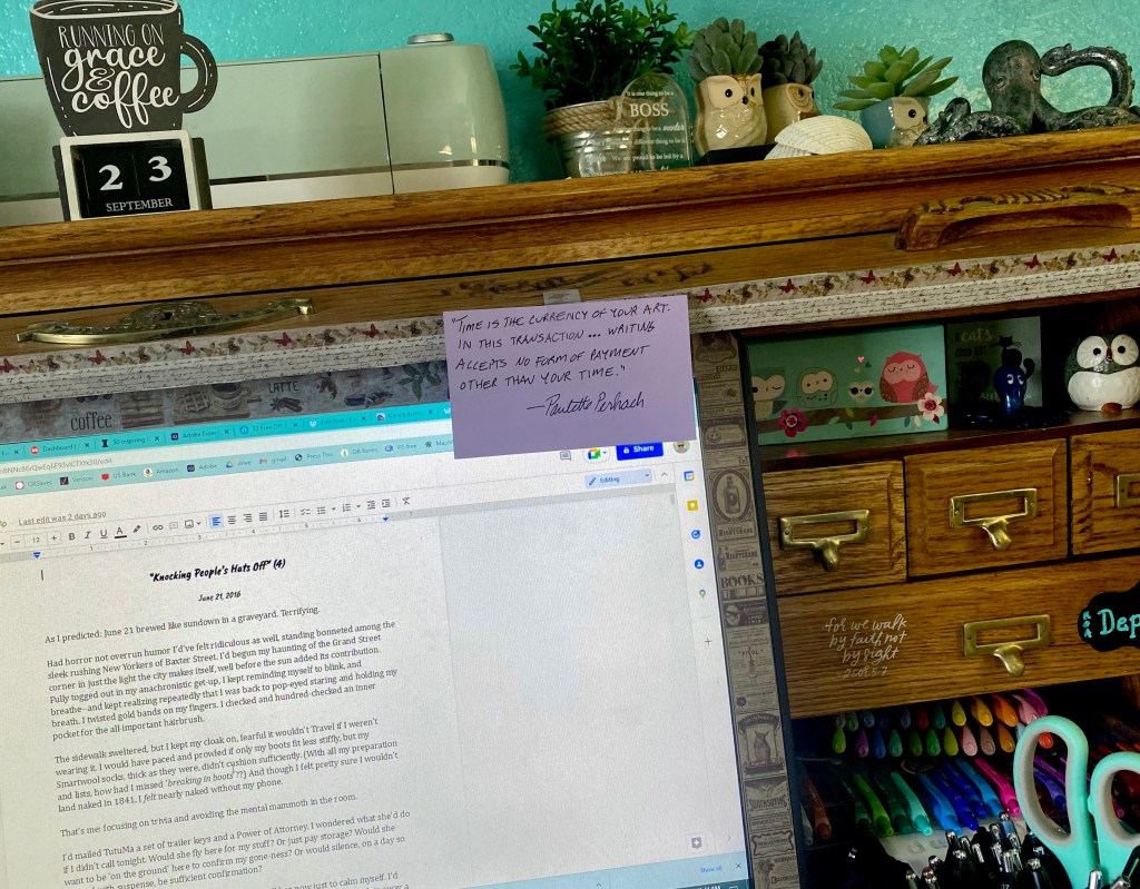 a writer's reminder taped to her desk: quote by Paulette Perhach that "time is the currency of your art"...