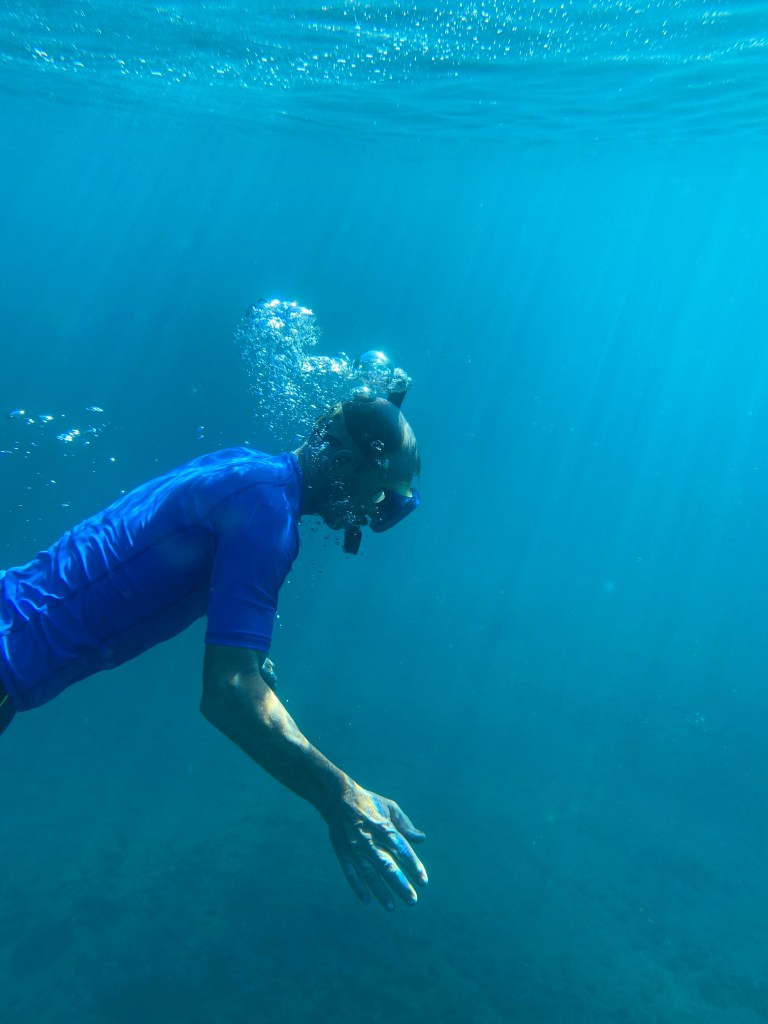 photo of the author's husband snorkeling