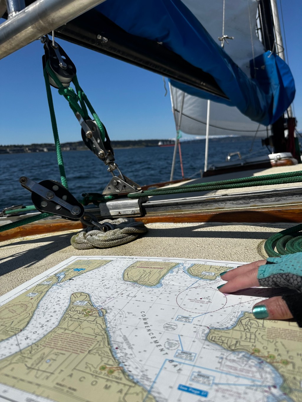 sailing chart atop a sailboat cabin