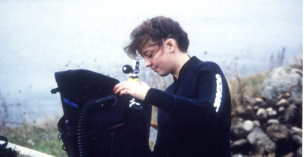 the writer at 18, setting up for certification dives