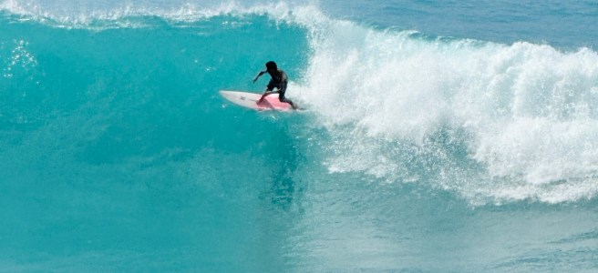 a surfer off Kona